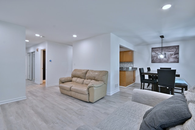 654 Kingsbridge Dr, Carol Stream, IL 60188 - living room with recessed lighting and light wood finished floors