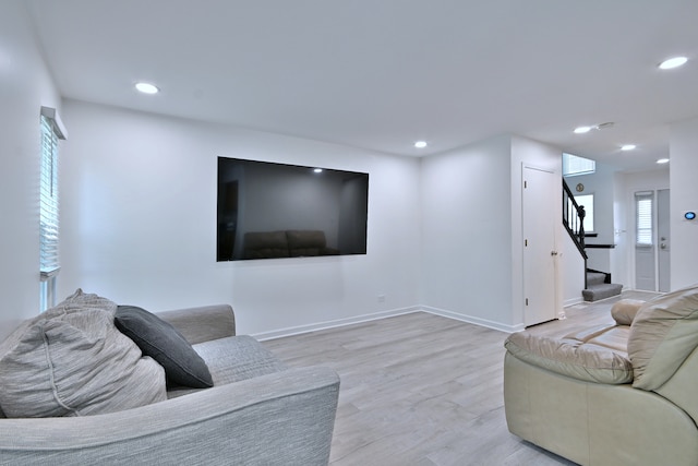 654 Kingsbridge Dr, Carol Stream, IL 60188 - living area with stairs, healthy amount of natural light, recessed lighting, and light wood-style flooring