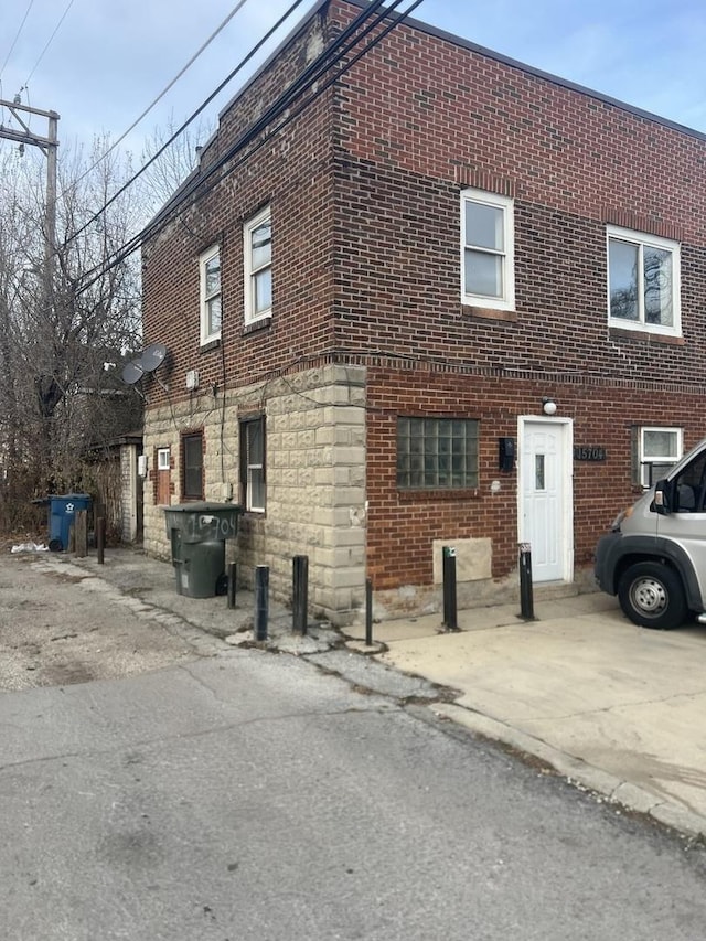 15704 Willard Ave, Harvey, IL 60426 - view of property exterior with brick siding and stone siding