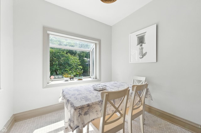 5729 S Harper Ave, Chicago, IL 60637 - carpeted dining room featuring baseboards