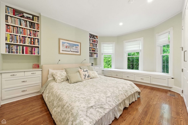 5729 S Harper Ave, Chicago, IL 60637 - bedroom featuring wood finished floors, crown molding, and recessed lighting
