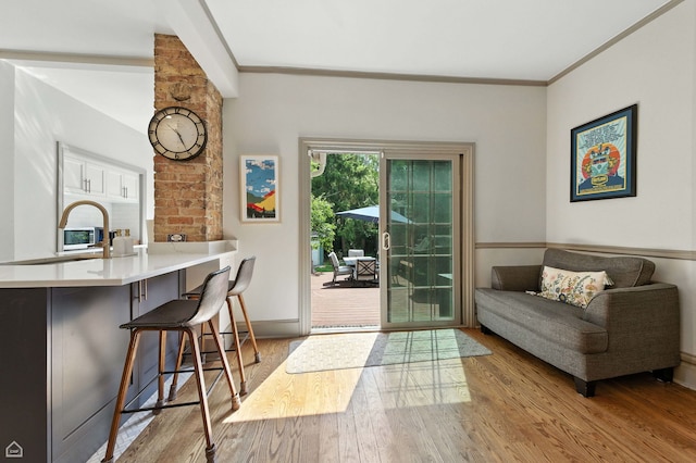 5729 S Harper Ave, Chicago, IL 60637 - living area featuring wood finished floors and crown molding