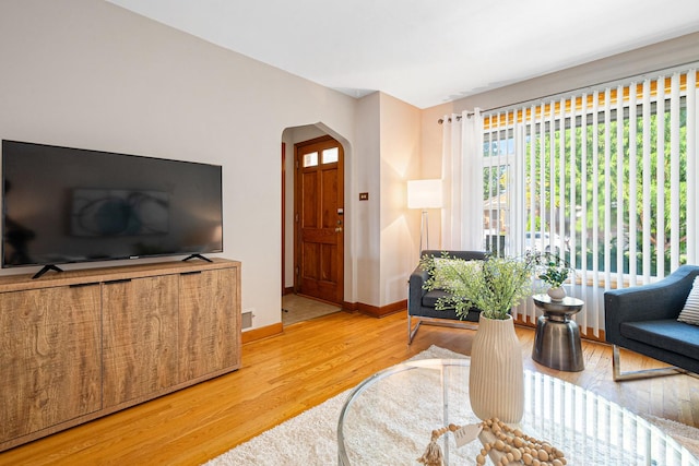 5401 S Nagle Ave, Chicago, IL 60638 - living area with arched walkways and wood finished floors
