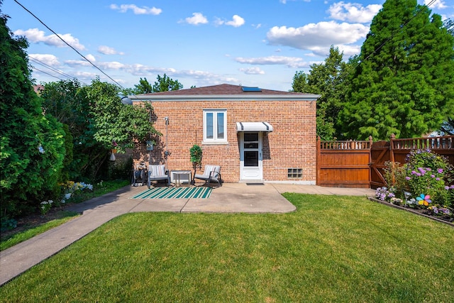 5401 S Nagle Ave, Chicago, IL 60638 - back of house with brick siding, a gate, and a patio area