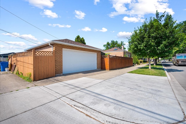5401 S Nagle Ave, Chicago, IL 60638 - view of front of house with brick siding and a detached garage