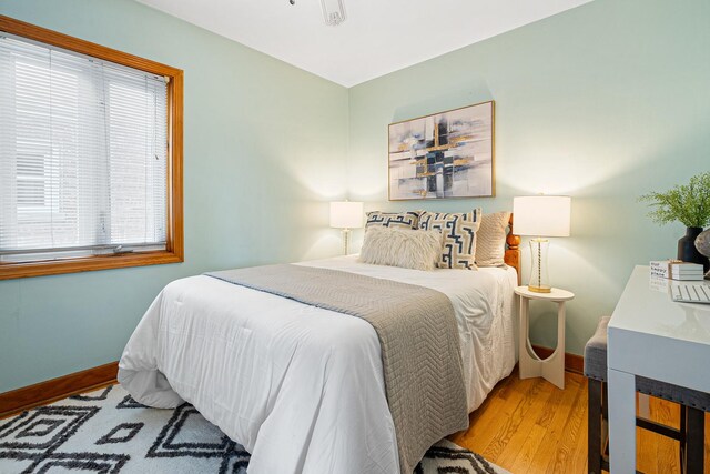 5401 S Nagle Ave, Chicago, IL 60638 - bedroom featuring wood finished floors and baseboards