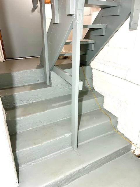 1226 175th St, East Hazel Crest, IL 60429 - staircase featuring concrete floors