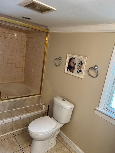 1226 175th St, East Hazel Crest, IL 60429 - bathroom featuring tile patterned flooring and tiled shower / bath combo