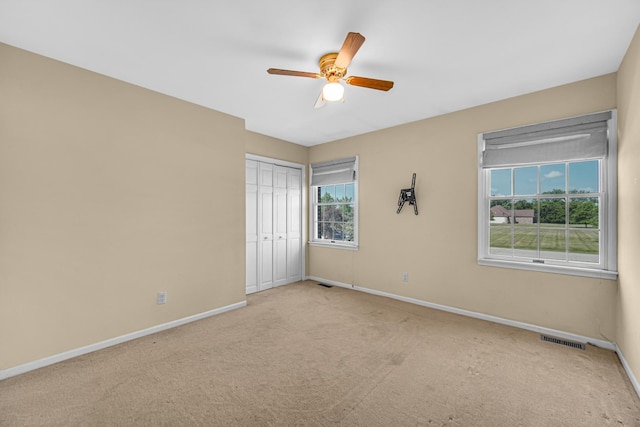 26711 S Greenbriar Dr, Monee, IL 60449 - unfurnished bedroom featuring carpet floors, a closet, and ceiling fan