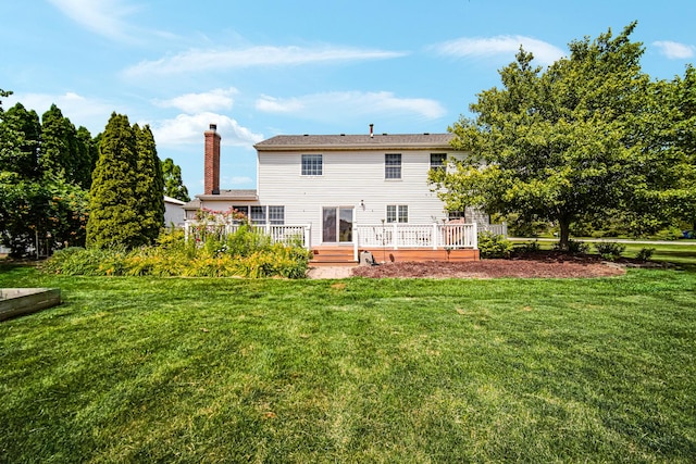 26711 S Greenbriar Dr, Monee, IL 60449 - back of property featuring a wooden deck, a lawn, and a chimney