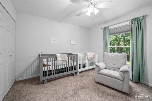 447 Newport Dr, Naperville, IL 60565 - bedroom featuring carpet flooring, ceiling fan, and a nursery area