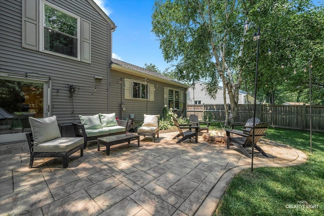 447 Newport Dr, Naperville, IL 60565 - fenced backyard featuring an outdoor living space with a fire pit and a patio