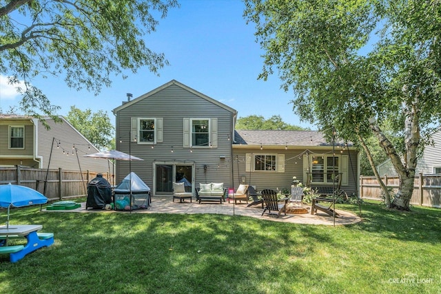 447 Newport Dr, Naperville, IL 60565 - back of house featuring a patio, a fenced backyard, and an outdoor living space