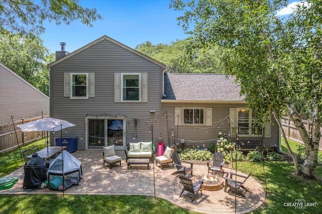 447 Newport Dr, Naperville, IL 60565 - rear view of house with an outdoor living space with a fire pit, a patio, roof with shingles, and a chimney