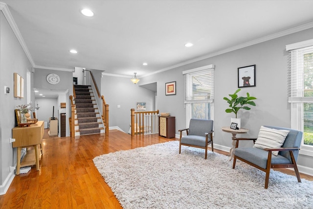 447 Newport Dr, Naperville, IL 60565 - sitting room featuring wood finished floors, crown molding, healthy amount of natural light, recessed lighting, and stairs