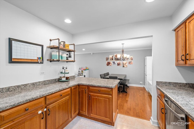 447 Newport Dr, Naperville, IL 60565 - kitchen with stainless steel dishwasher, brown cabinetry, a chandelier, a peninsula, and recessed lighting