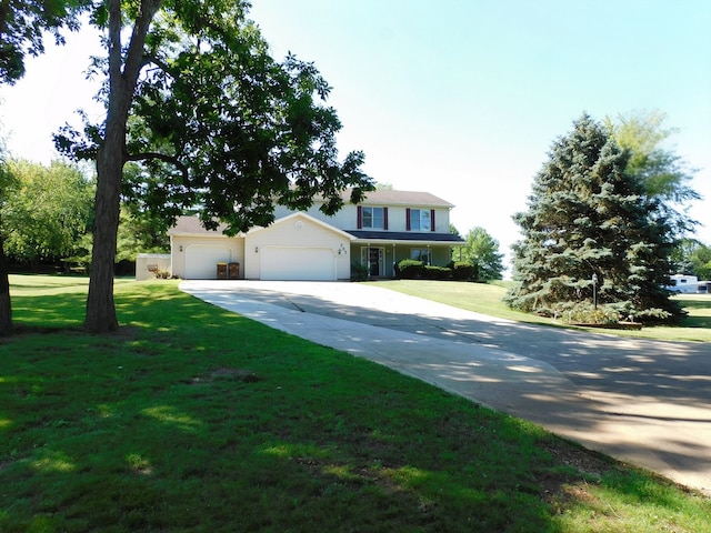 565 Sandra Cir, Freeport, IL 61032 - view of front of property featuring a garage, concrete driveway, and a front yard