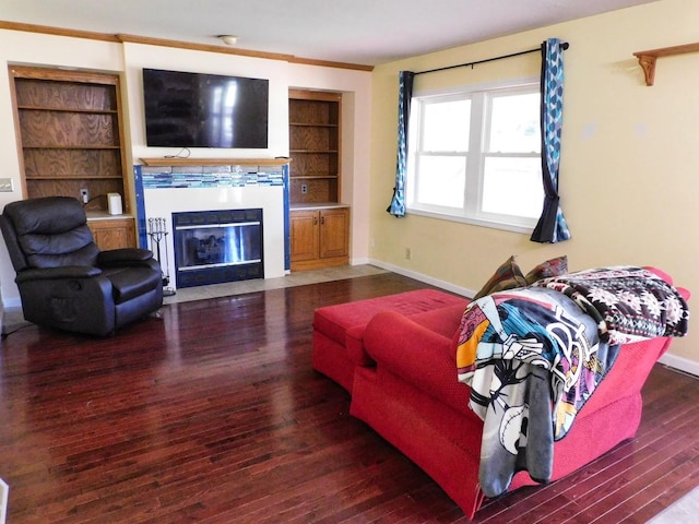 565 Sandra Cir, Freeport, IL 61032 - living area with a fireplace with flush hearth, wood finished floors, and built in features