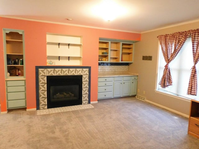 565 Sandra Cir, Freeport, IL 61032 - unfurnished living room with ornamental molding, carpet flooring, and a tiled fireplace