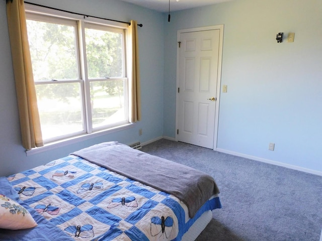 565 Sandra Cir, Freeport, IL 61032 - carpeted bedroom with baseboards