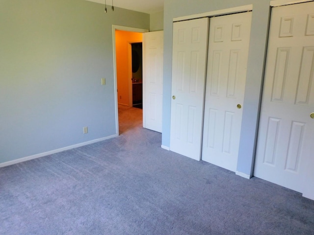 565 Sandra Cir, Freeport, IL 61032 - unfurnished bedroom featuring carpet floors and a closet