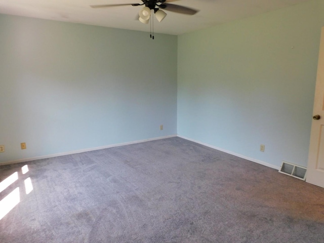 565 Sandra Cir, Freeport, IL 61032 - spare room with ceiling fan and carpet flooring