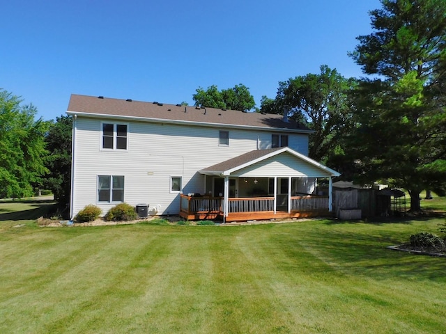 565 Sandra Cir, Freeport, IL 61032 - back of house with a yard and a wooden deck
