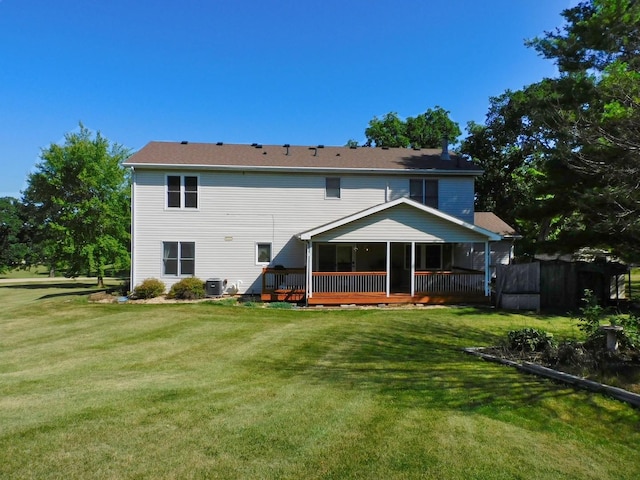 565 Sandra Cir, Freeport, IL 61032 - rear view of property featuring a yard and a wooden deck