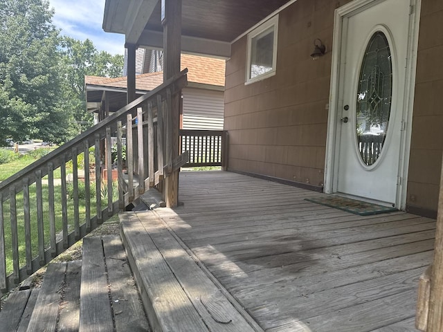 614 N Jackson St, Clinton, IL 61727 - wooden deck featuring stairway