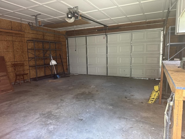 614 N Jackson St, Clinton, IL 61727 - garage featuring a garage door opener