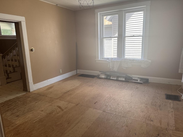614 N Jackson St, Clinton, IL 61727 - unfurnished room with stairs and baseboards
