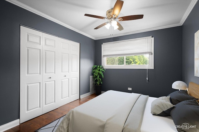 2300 Old Tavern Rd Unit 101, Lisle, IL 60532 - bedroom with crown molding, wood finished floors, a closet, and a ceiling fan