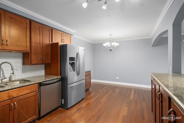 2300 Old Tavern Rd Unit 101, Lisle, IL 60532 - kitchen with stainless steel appliances, dark wood-style floors, decorative backsplash, a chandelier, and dark stone countertops