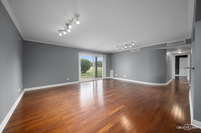 2300 Old Tavern Rd Unit 101, Lisle, IL 60532 - empty room featuring rail lighting, ornamental molding, and hardwood / wood-style flooring