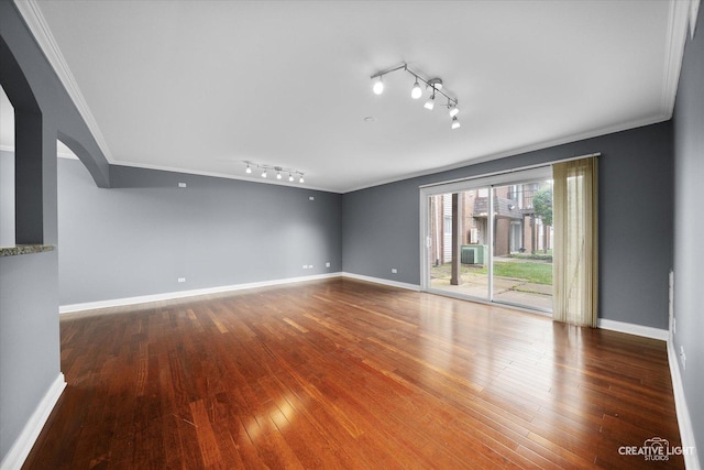2300 Old Tavern Rd Unit 101, Lisle, IL 60532 - empty room with ornamental molding, track lighting, arched walkways, and hardwood / wood-style flooring