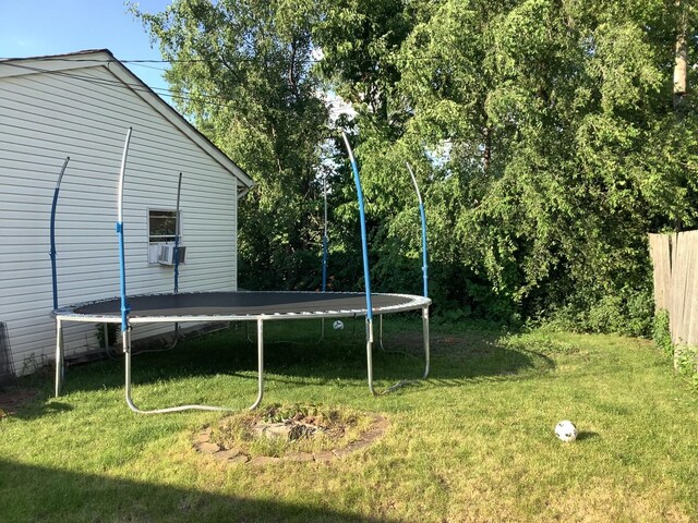 427 Kenyon Ave, Romeoville, IL 60446 - view of green lawn with a trampoline
