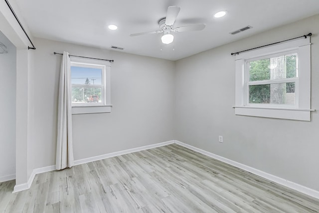 43173 N Lake Ave, Antioch, IL 60002 - empty room featuring plenty of natural light, light wood-type flooring, recessed lighting, and ceiling fan