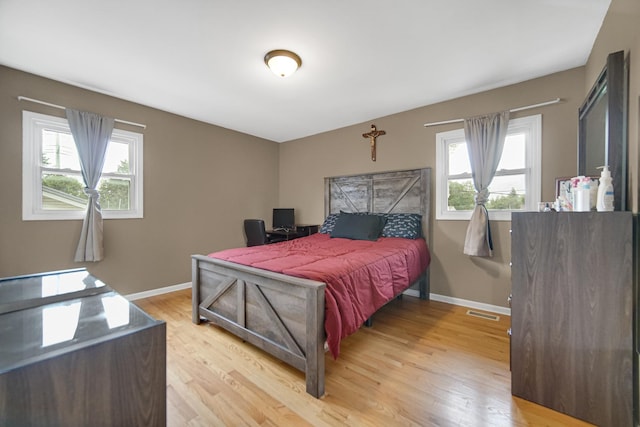 609 W Romeo Rd, Romeoville, IL 60446 - bedroom with light wood finished floors