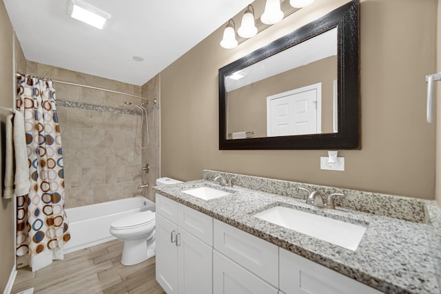 609 W Romeo Rd, Romeoville, IL 60446 - bathroom featuring shower / bath combo with shower curtain, double vanity, and wood finished floors