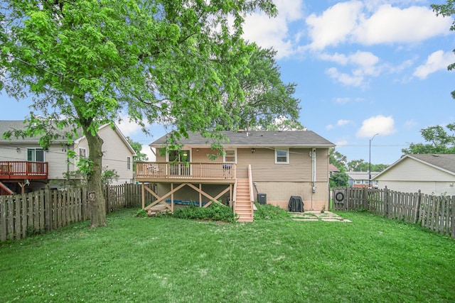 609 W Romeo Rd, Romeoville, IL 60446 - back of property featuring stairway, a wooden deck, and a fenced backyard