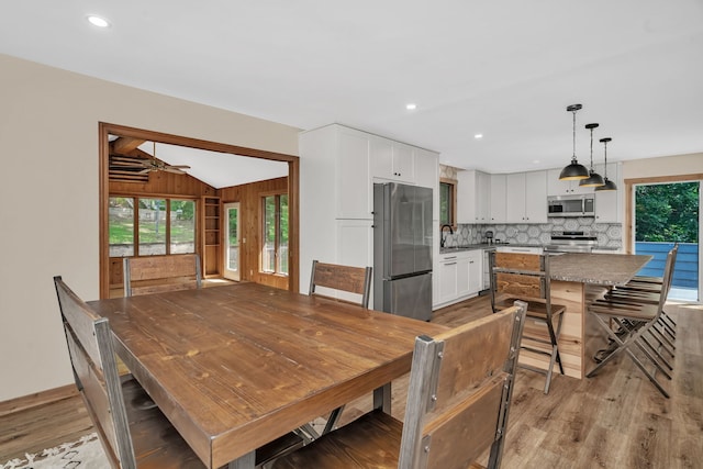 746 Old Stage Rd, Morris, IL 60450 - dining room with light wood-style flooring, lofted ceiling, recessed lighting, and a ceiling fan