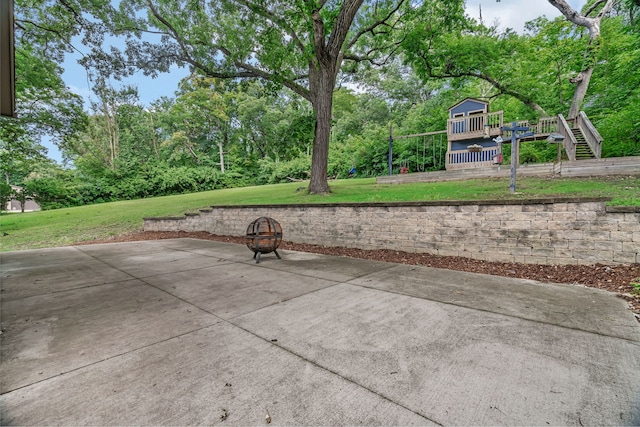 746 Old Stage Rd, Morris, IL 60450 - view of patio / terrace with a fire pit, a deck, stairway, and view of scattered trees