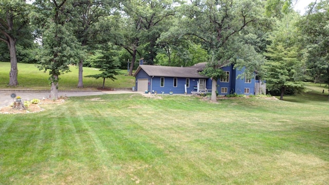 746 Old Stage Rd, Morris, IL 60450 - view of grassy yard featuring concrete driveway and view of scattered trees