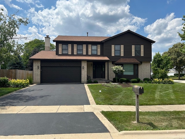 105 Golf View Cir, Prospect Heights, IL 60070 - traditional-style house with driveway, a garage, and brick siding