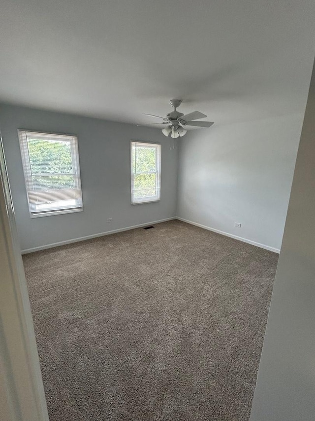105 Golf View Cir, Prospect Heights, IL 60070 - carpeted empty room with baseboards and a ceiling fan