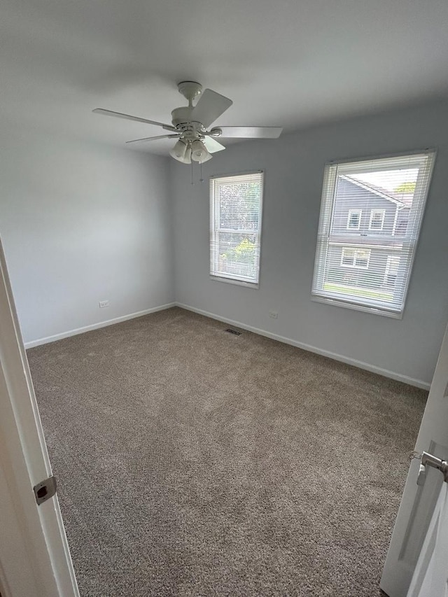 105 Golf View Cir, Prospect Heights, IL 60070 - spare room featuring carpet and a ceiling fan