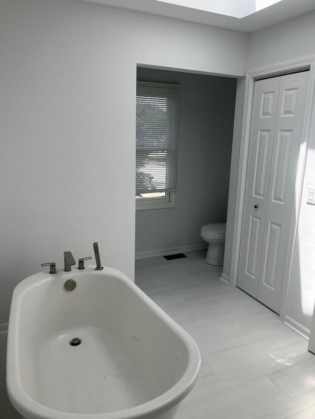 105 Golf View Cir, Prospect Heights, IL 60070 - full bath featuring a freestanding bath and a closet