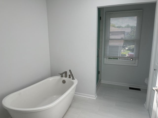 105 Golf View Cir, Prospect Heights, IL 60070 - bathroom featuring a freestanding bath and a shower stall