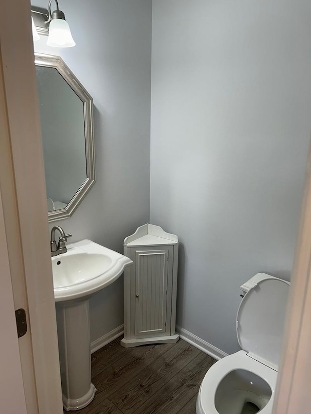 105 Golf View Cir, Prospect Heights, IL 60070 - half bathroom featuring wood finished floors and toilet