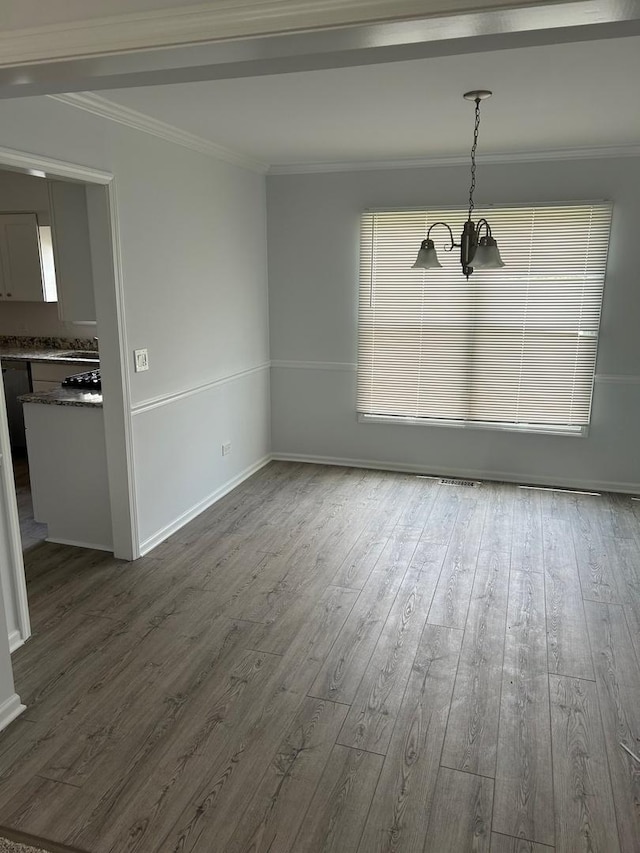 105 Golf View Cir, Prospect Heights, IL 60070 - unfurnished dining area with a chandelier, crown molding, and dark wood finished floors